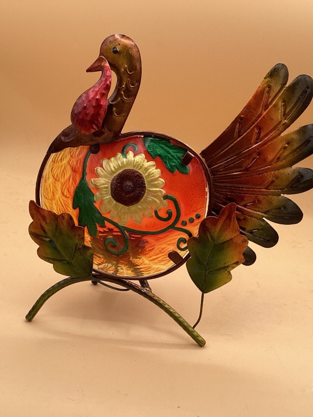 Decorative turkey with tea light holder on back